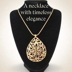 Gold-tone Statement Necklace with lobster claw clasp.  Brand new.